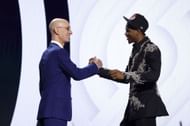 Scoot Henderson (R) poses with NBA commissioner Adam Silver (L) after being drafted third overall pick by the Portland Trail Blazers in the 2023 NBA draft